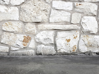 White stone wall with floor background
