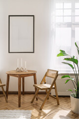 Boho living room with minimalist furniture and natural light