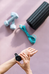 Smart fitness tracker in use during indoor workout session for health and recovery