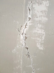 Old vintage cracked vertical wall.