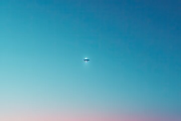 minimalistic image of clear sky with subtle silhouette of ufo leaving abundant copy space below
