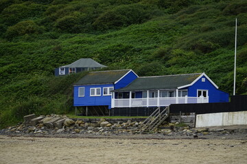 Blue beach hut by the sea