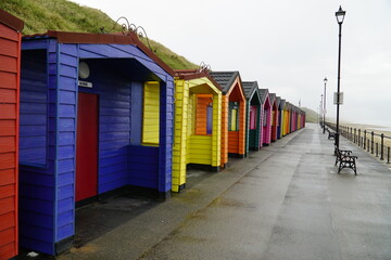 Colourful seaside beach huts