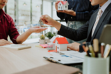 Real Estate Agent Handing Over Keys