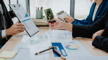 Business Team Analyzing Financial Data