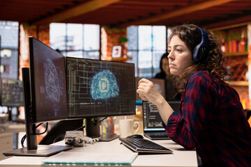 AI industry startup technician coding and listening podcasts in office to make time pass faster....
