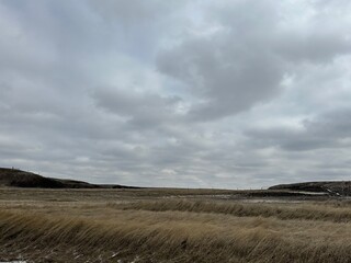 Rural Alberta Canada, clouds over the hills