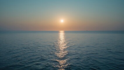Fototapeta premium A calm sea with limited sunlight from afar