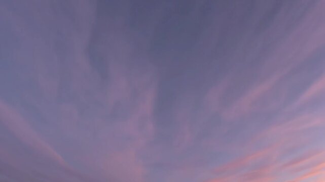 Pink sky with soft twilight clouds