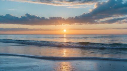 Obraz premium Sunset over the ocean with waves and clouds, creating a serene and peaceful scene. Nature and beauty, landscape photography. The concept of tranquility and natural scenery.