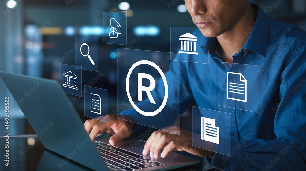 Aufkleber man using laptop with trademark symbol and document icons floating above keyboard in blue lighting