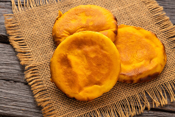 Arepa boyacense with cheese, slightly sweet, crispy on the outside and soft on the inside