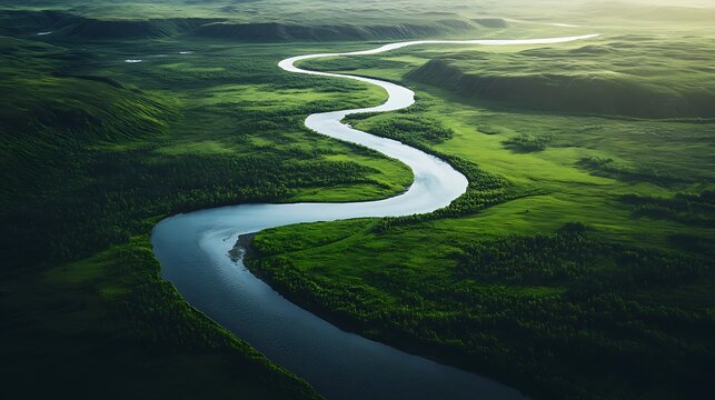 Winding river meanders through lush green landscape.