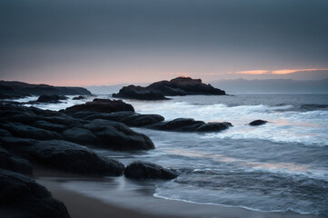 Fototapeta premium Rocky shoreline in in coastal wind