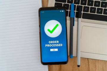 Notification of order processed successfully. Concept of online shopping and buying retail through...