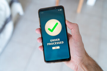 Order processed notification on smart phone.