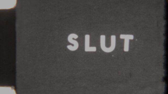 Minimalist End Title Slut In White On Black Background