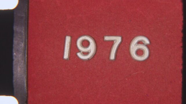 Old 8mm Film Leader With 1976 Title And Grainy Red Backdrop