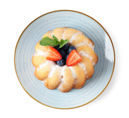 Tasty Bundt cake with powdered sugar and berries isolated on white, top view
