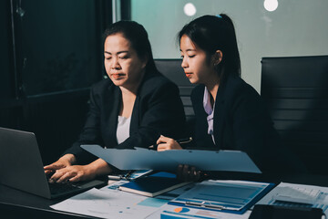 Entrepreneurs and business people conference in modern meeting room, happy multiracial coworkers have fun cooperating working together at office meeting, asian teamwork concept