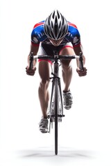 A professional cyclist in racing gear rides a road bike, captured from the front in a dynamic, high-speed pose.