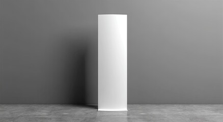 Blank promotional roll-up banner against a gray wall