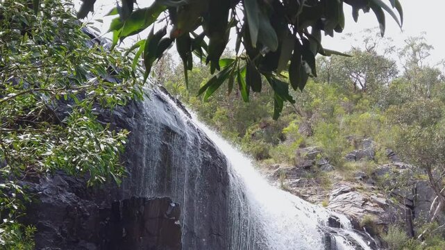 Slow motion of waterfall cascading down at MacKenzie Falls