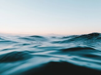 Obraz premium Serene Ocean Waves at Sunset, Teal and Blue Water