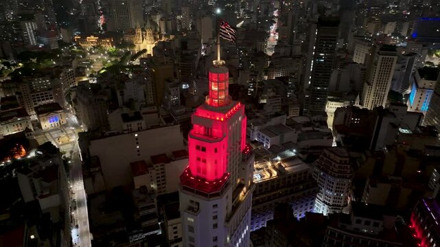 Night Santander Lighthouse In Sao Paulo Brazil. Modern Glass Skyscraper Soars Above A Bustling City. Building Town Sky Illuminated Urban. Town Outdoors Illuminated . Sao Paulo Brazil.