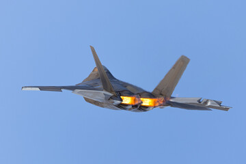 Extremely close  tail view of a  F-22 Raptor  with afterburners on