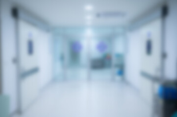 Blurred image of an empty corridor to operating room in hospital.