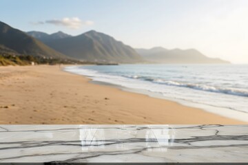 Selective focus.Marble top table on blur sea beach landscape, A blurred beach scene with mountains in the background, natural lighting, and a marble countertop in the foreground