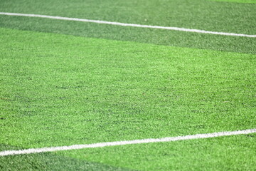 Obraz premium artificial green grass background for playground