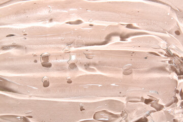 Texture of shower gel on color background, closeup