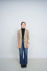 A collection of studio portraits featuring a stylish young woman posing in various confident stances against a clean white background.