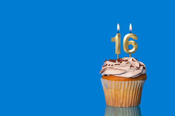 Birthday Or Anniversary Cupcake with Lit Candle; Number 16 Candle.
