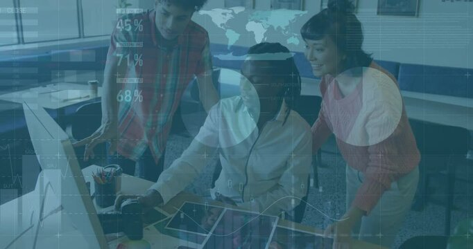 Seated designer clicking mouse triggers team pointing layouts and revising tablet for design review