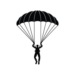 Silhouette of a skydiver descending from above using a parachute in the sky