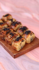 Jakarta's signature baked Bolen cake photographed at various angles of 45 degrees, front view and flat lay. isolate object