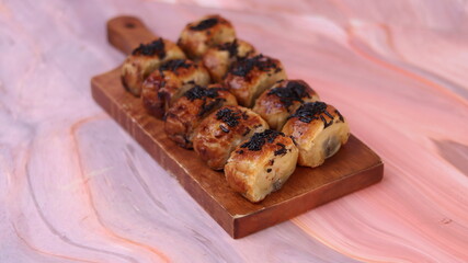 Jakarta's signature baked Bolen cake photographed at various angles of 45 degrees, front view and flat lay. isolate object