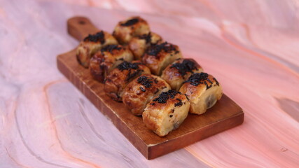 Jakarta's signature baked Bolen cake photographed at various angles of 45 degrees, front view and flat lay. isolate object