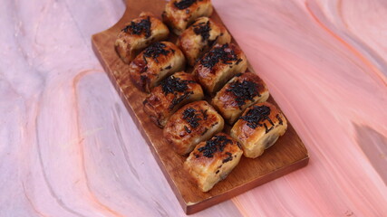 Jakarta's signature baked Bolen cake photographed at various angles of 45 degrees, front view and...