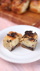 Jakarta's signature baked Bolen cake photographed at various angles of 45 degrees, front view and flat lay. isolate object