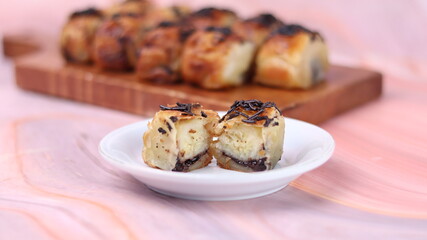 Jakarta's signature baked Bolen cake photographed at various angles of 45 degrees, front view and...