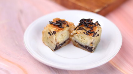 Jakarta's signature baked Bolen cake photographed at various angles of 45 degrees, front view and...