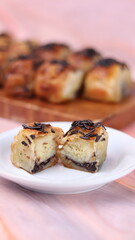 Jakarta's signature baked Bolen cake photographed at various angles of 45 degrees, front view and flat lay. isolate object