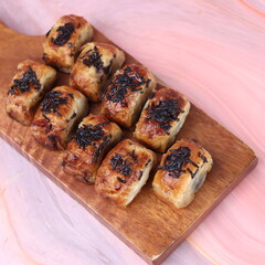 Jakarta's signature baked Bolen cake photographed at various angles of 45 degrees, front view and...