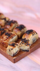 Jakarta's signature baked Bolen cake photographed at various angles of 45 degrees, front view and flat lay. isolate object