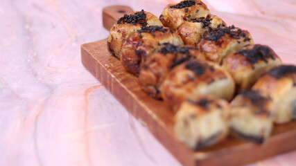 Jakarta's signature baked Bolen cake photographed at various angles of 45 degrees, front view and flat lay. isolate object