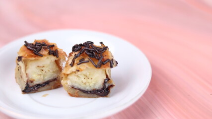 Jakarta's signature baked Bolen cake photographed at various angles of 45 degrees, front view and flat lay. isolate object